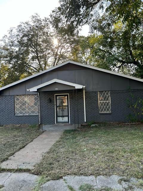 a front view of a house with a garage