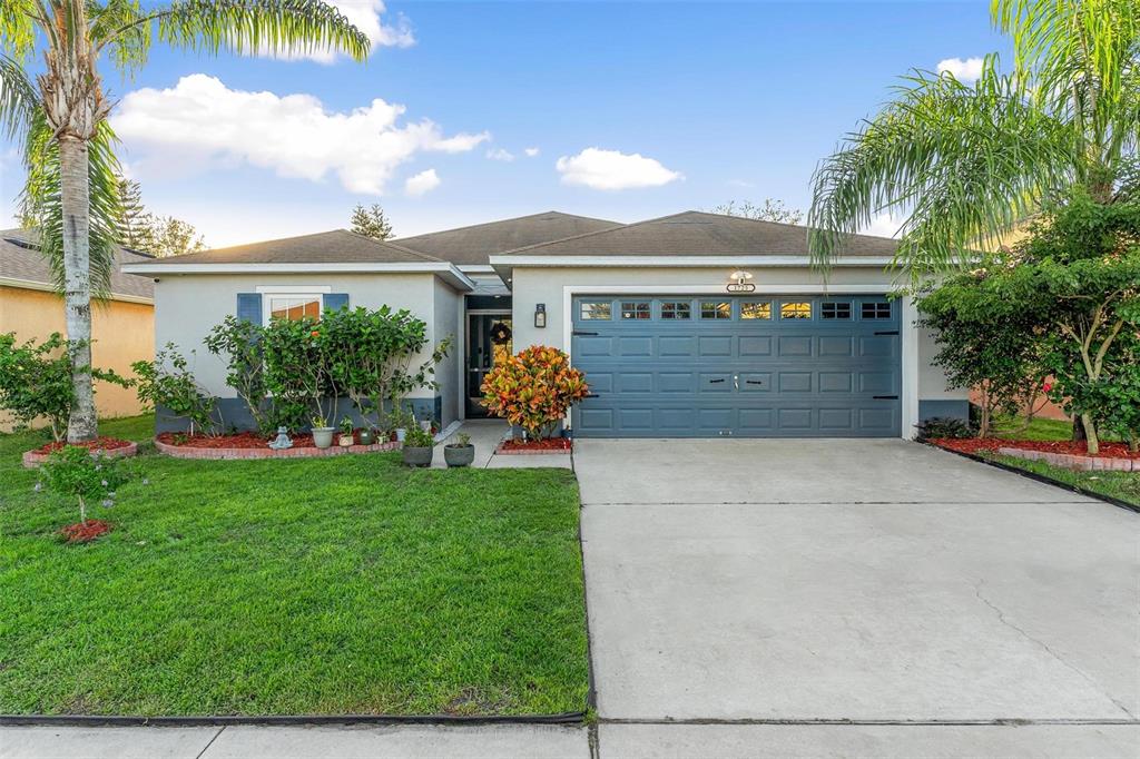 front view of a house with a yard