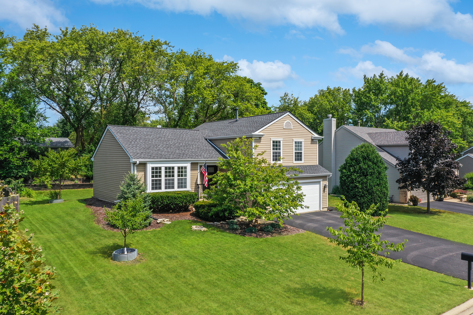 a house view with a garden space