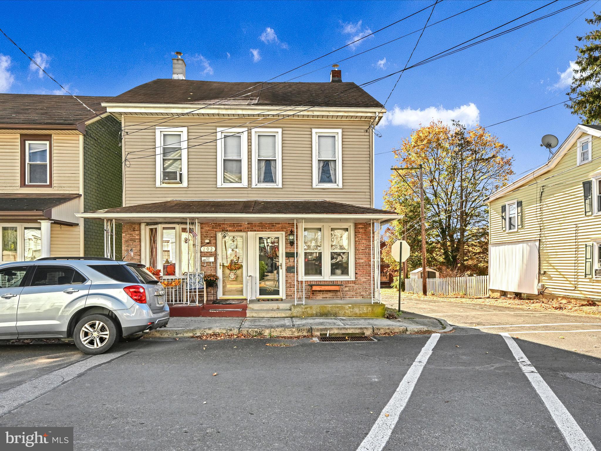 a car parked in front of a house