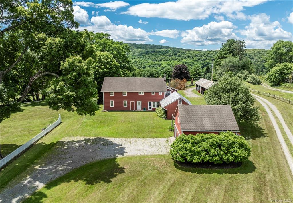 an aerial view of a house with a garden