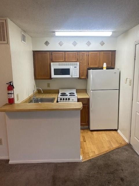 a utility room with washer and dryer