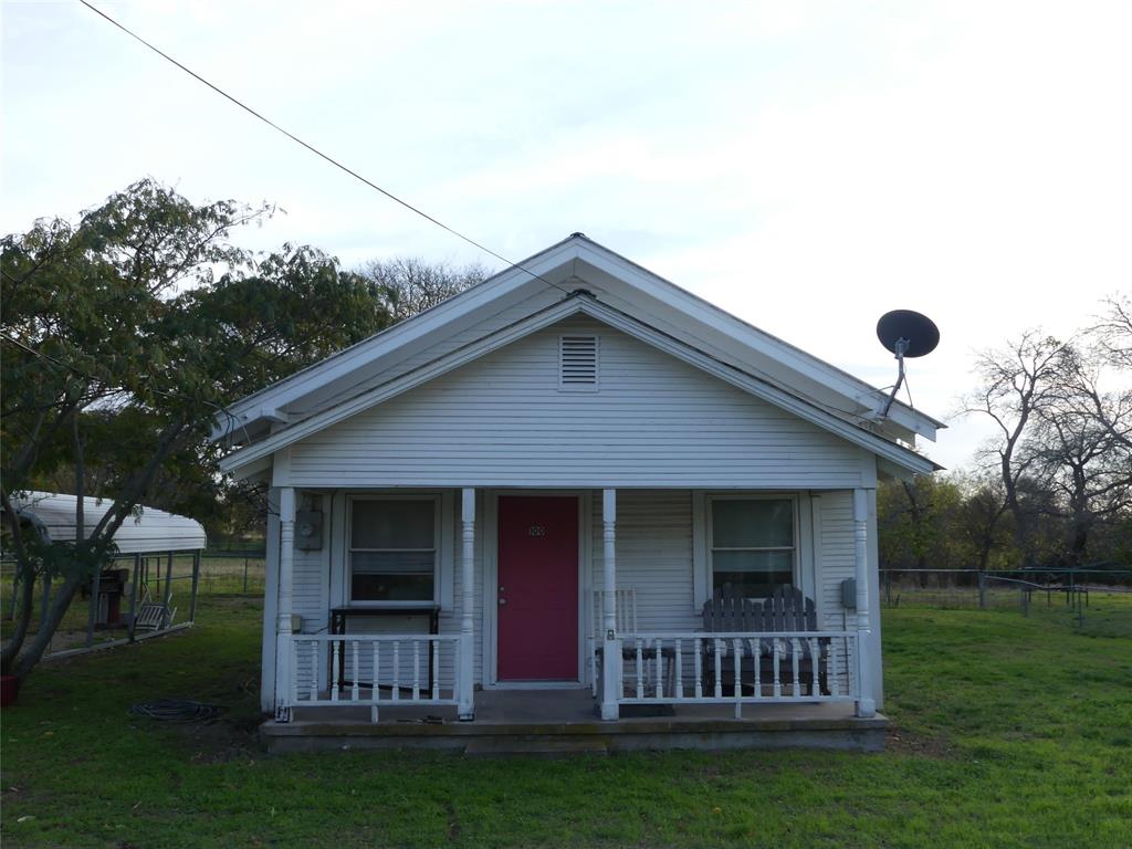 a view of a house with garden