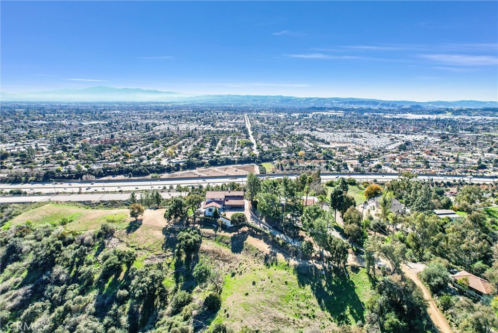 an aerial view of residential building and lake view