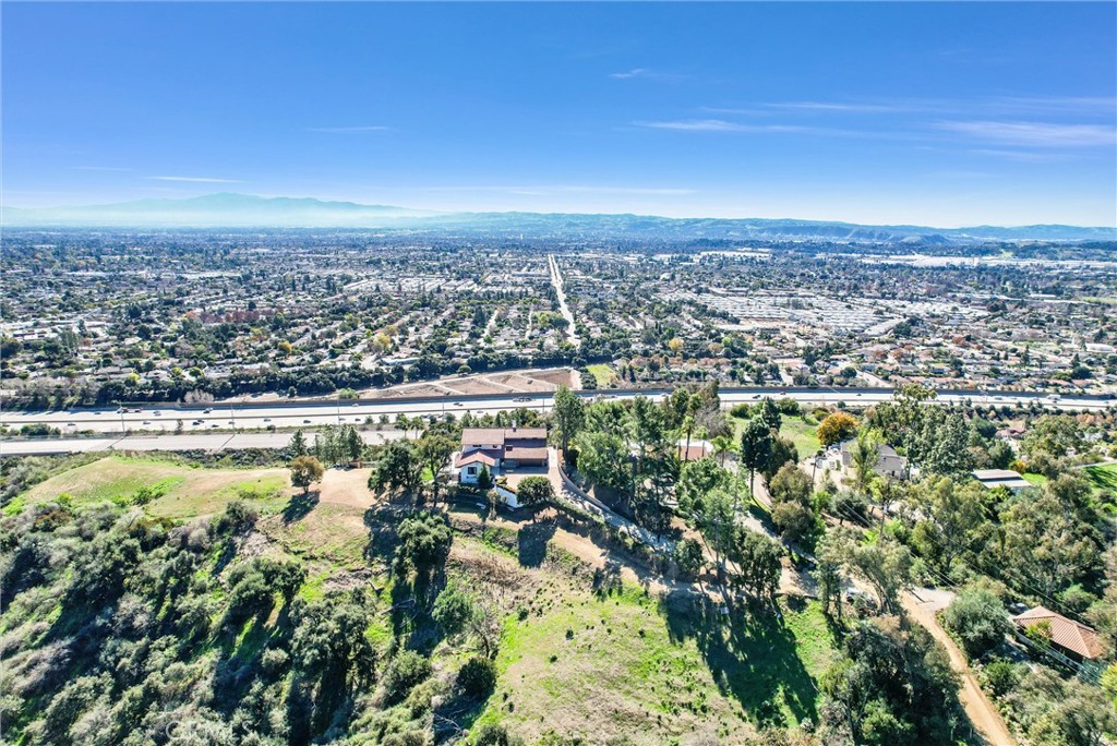 an aerial view of residential building and lake view