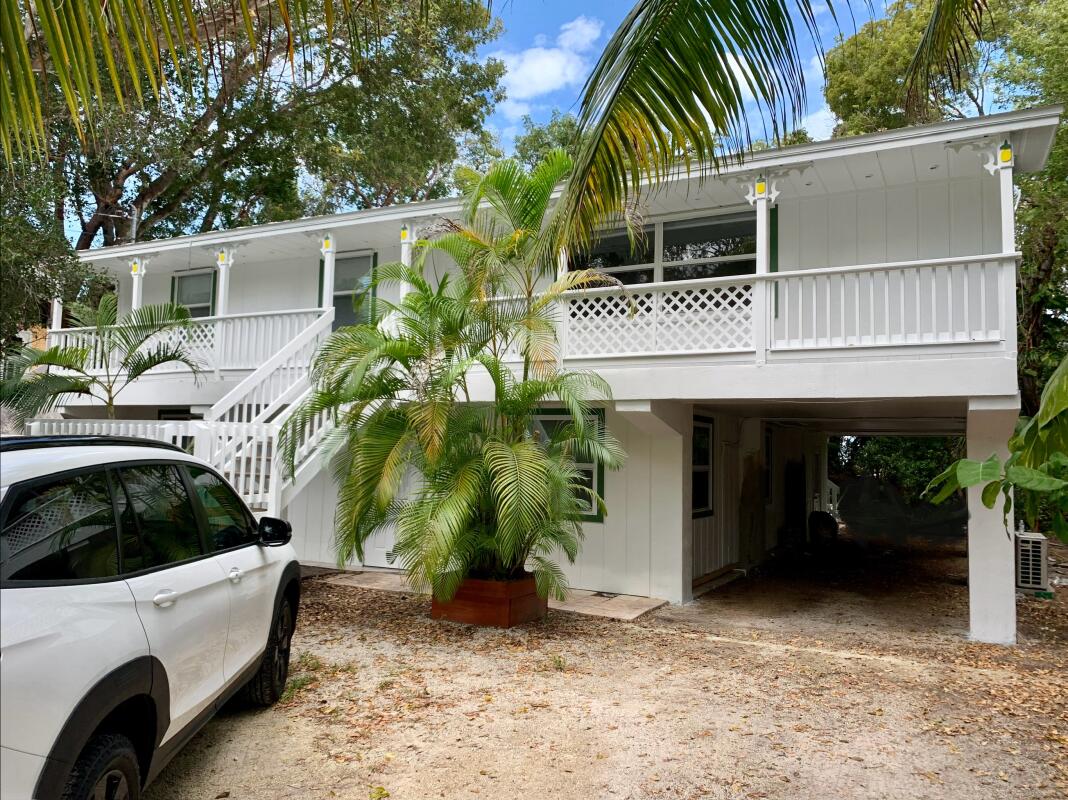 a front view of a house with a garage