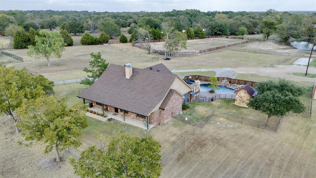 an aerial view of a house with garden