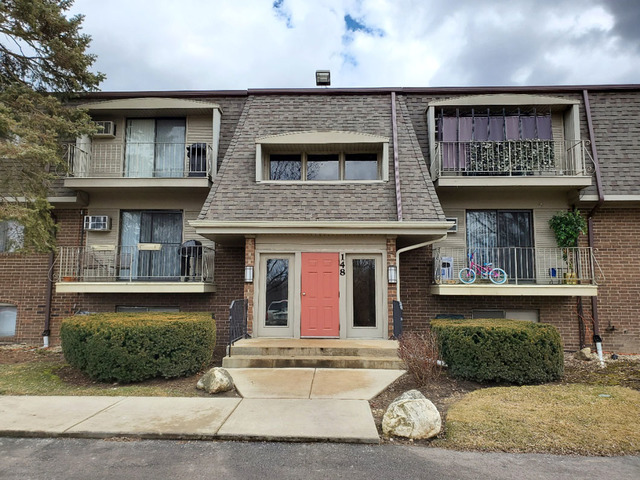 a front view of a house with entertaining space