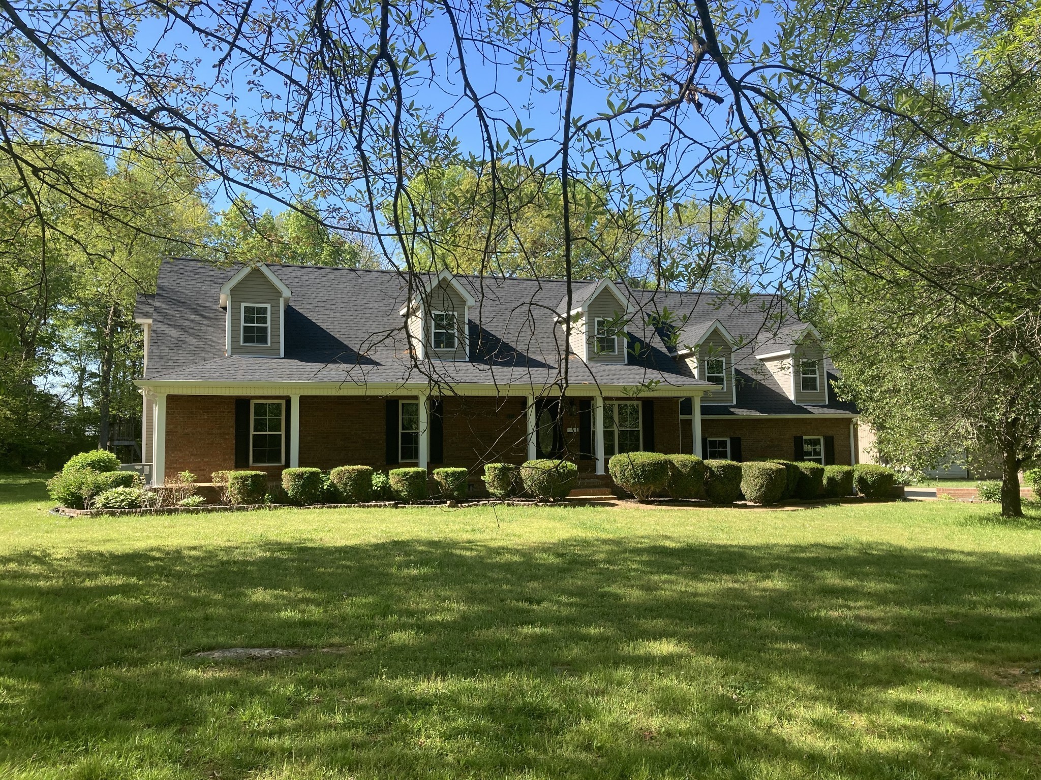 a view of a house with a big yard