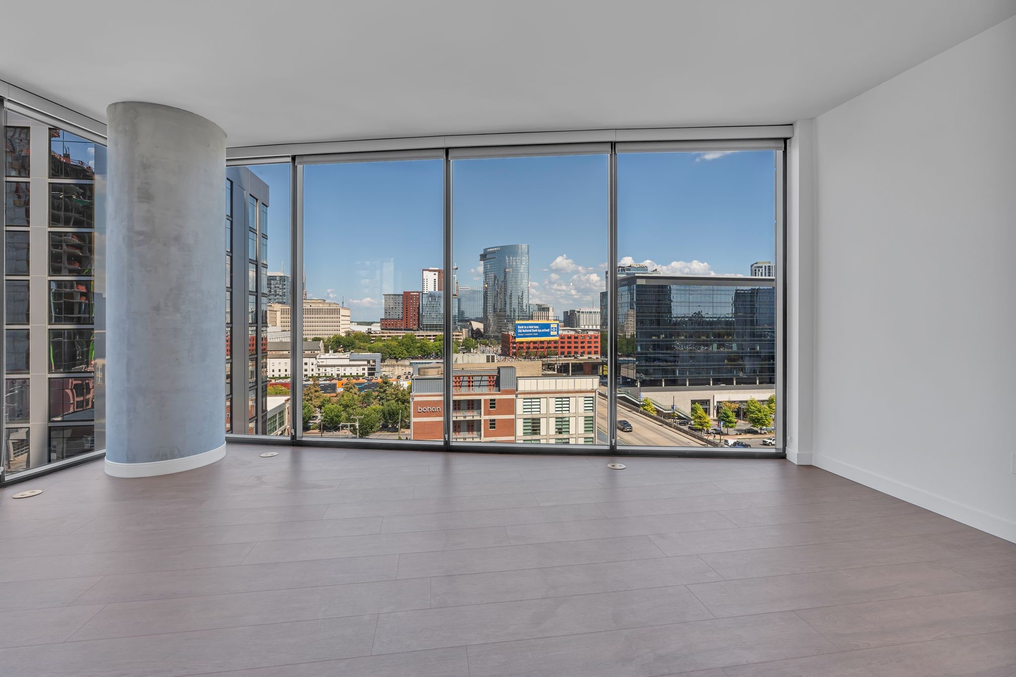 Your view from the kitchen, through the living room, and onto the city.