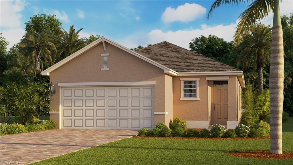 View of front facade with a garage and a front yard