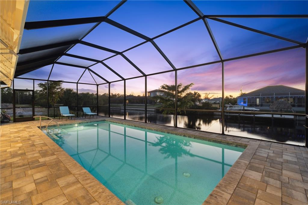 a view of a swimming pool with a chair