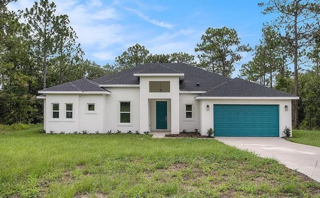 front view of house with a yard