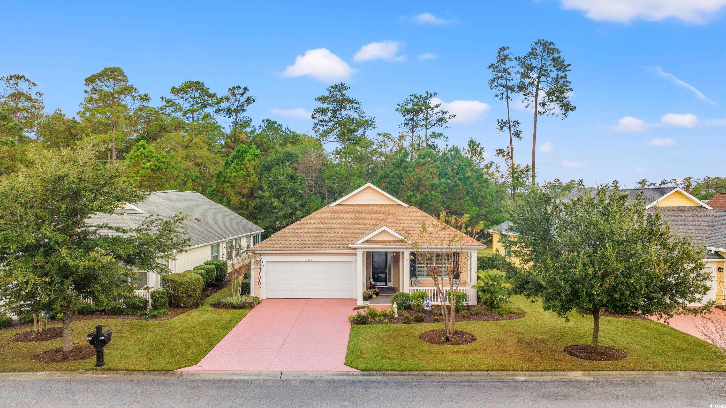 View of front of property featuring a front yard,