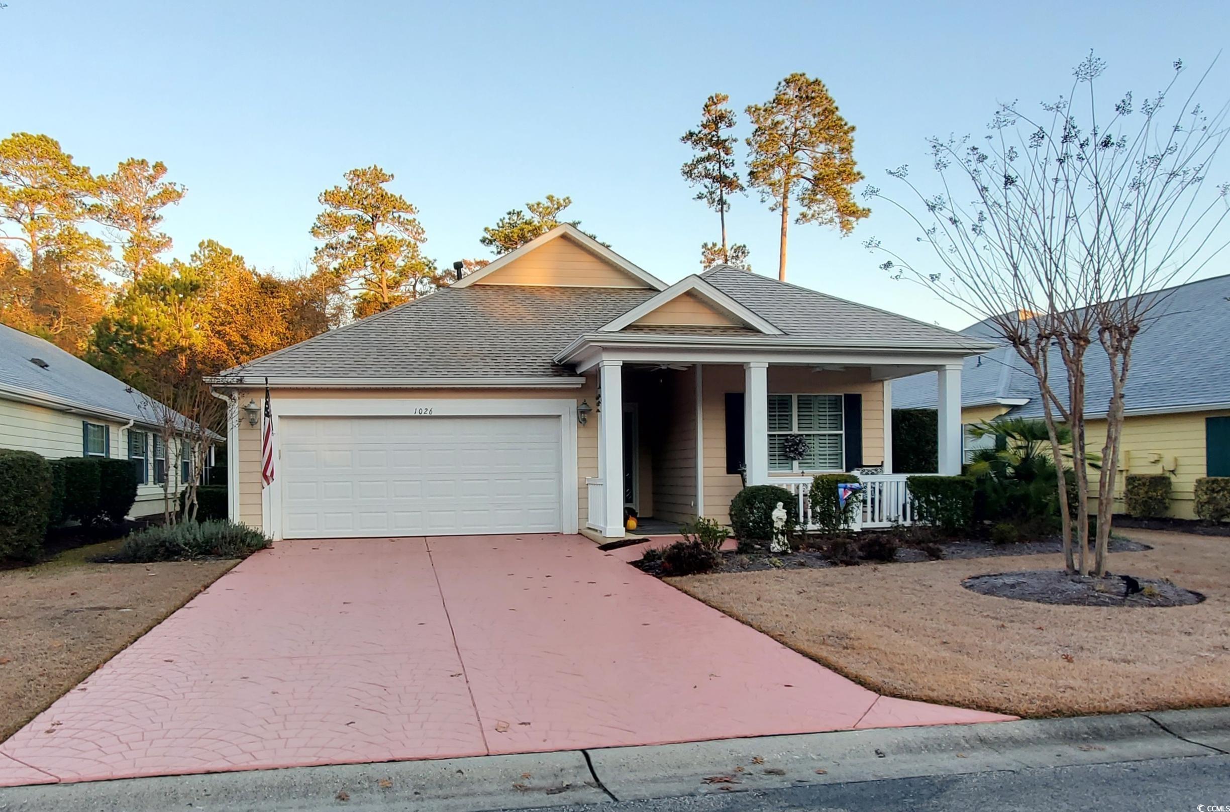 View of front of property featuring a front yard,