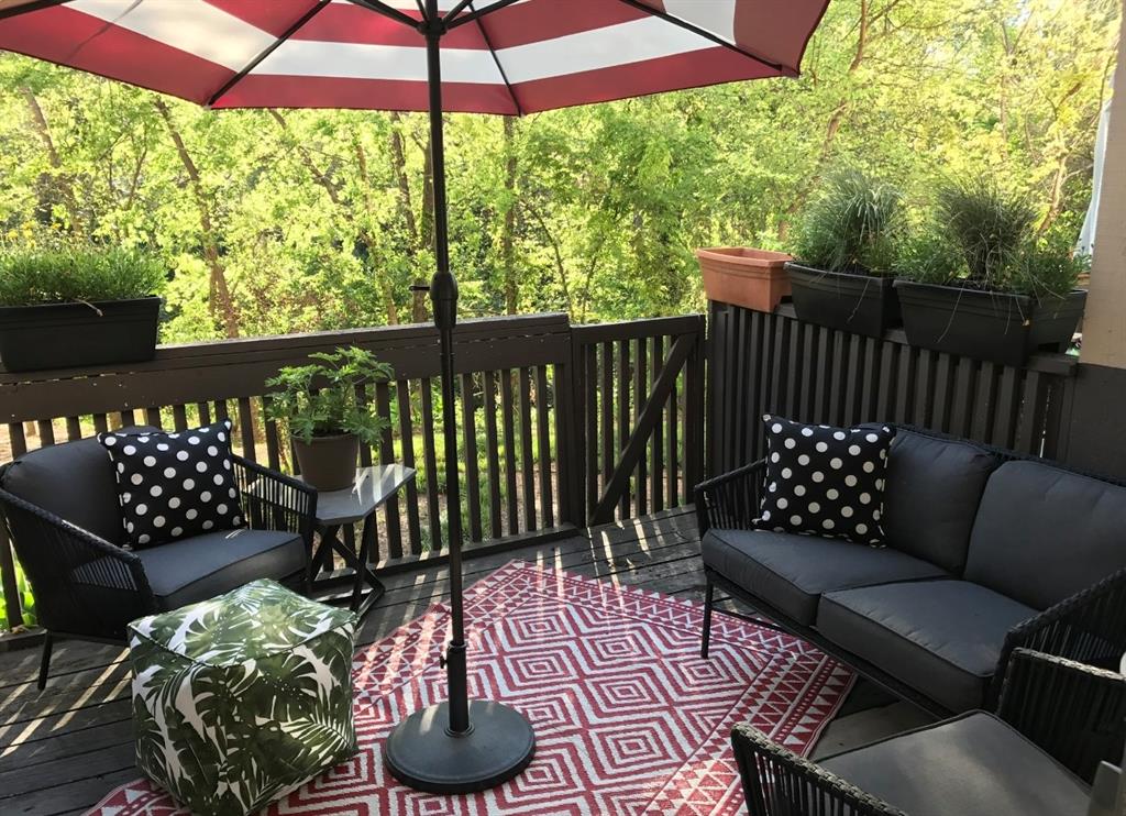 a view of a two chairs in the deck