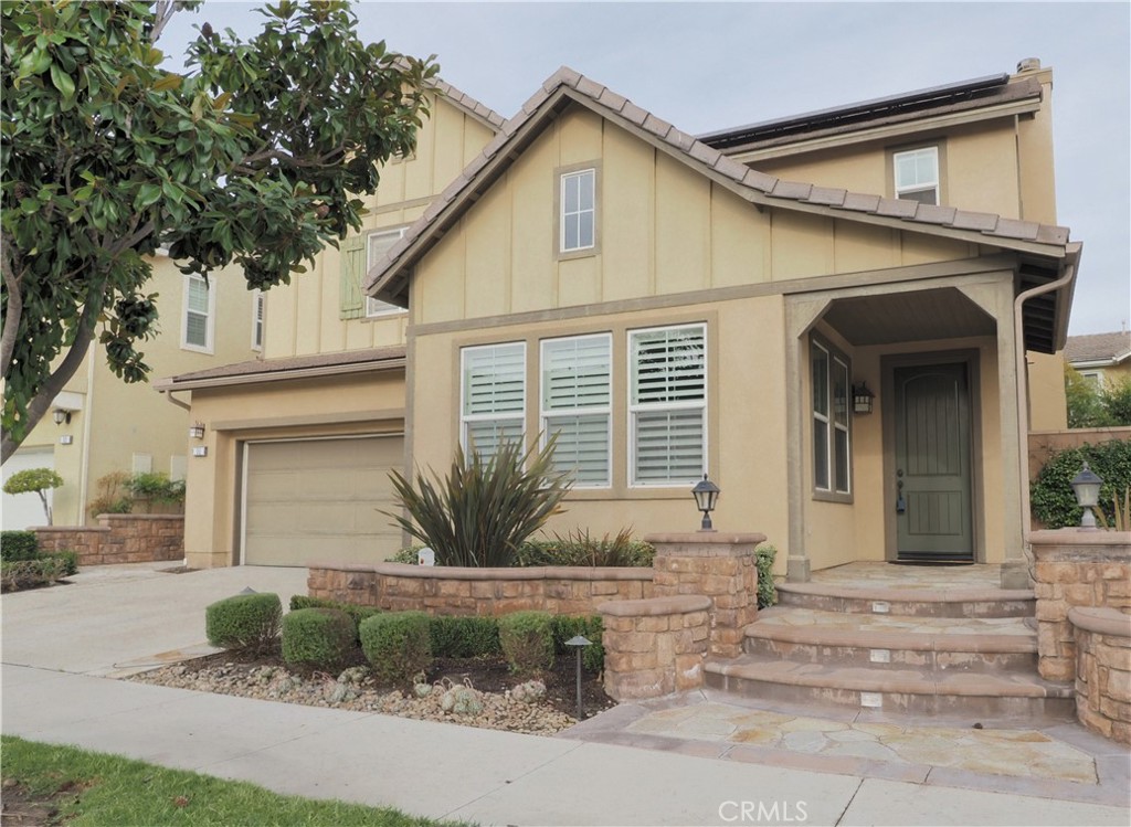 Front with long driveway