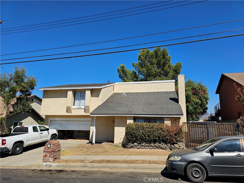 front view of a house with a street