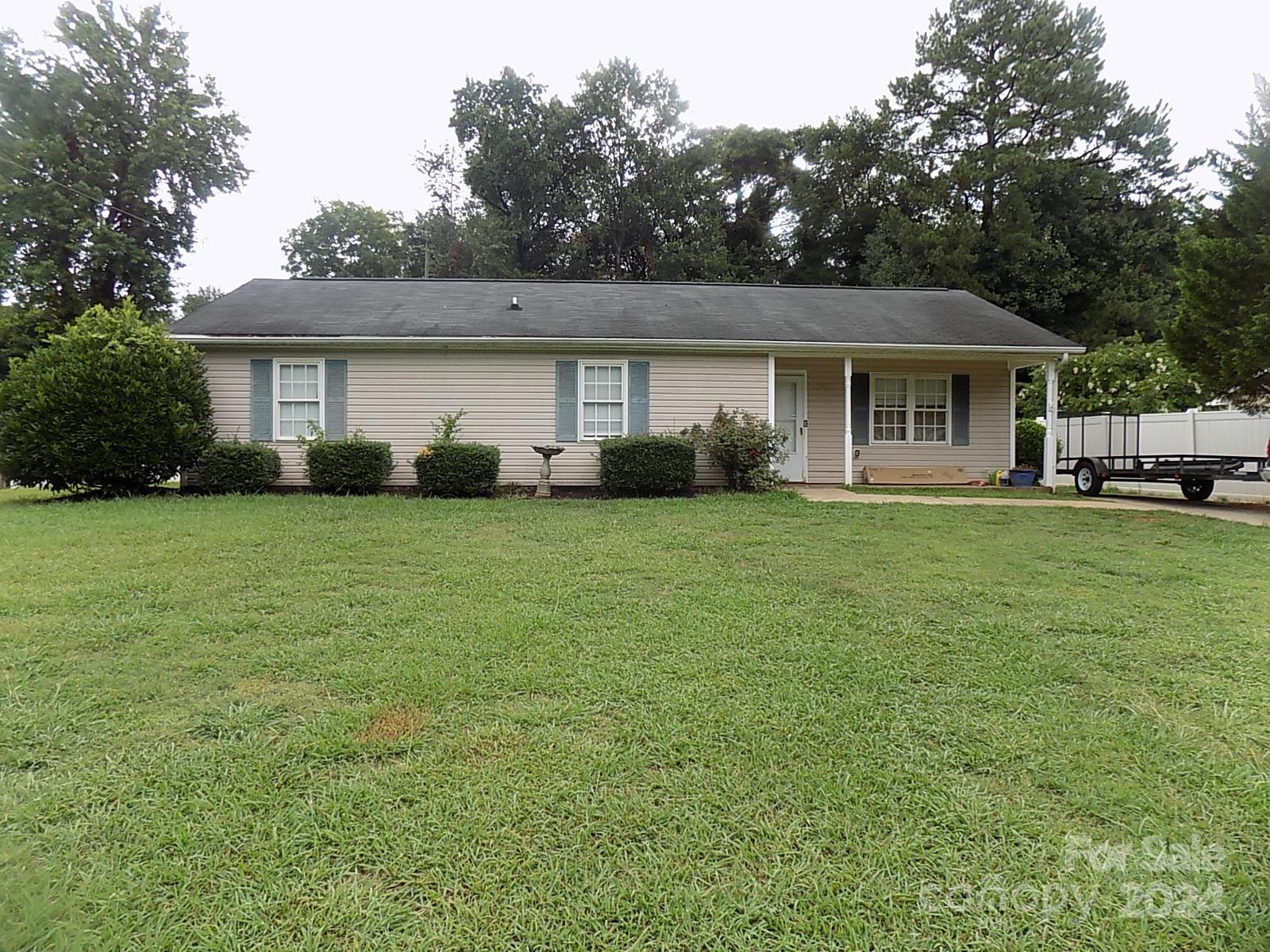 front view of a house and a yard