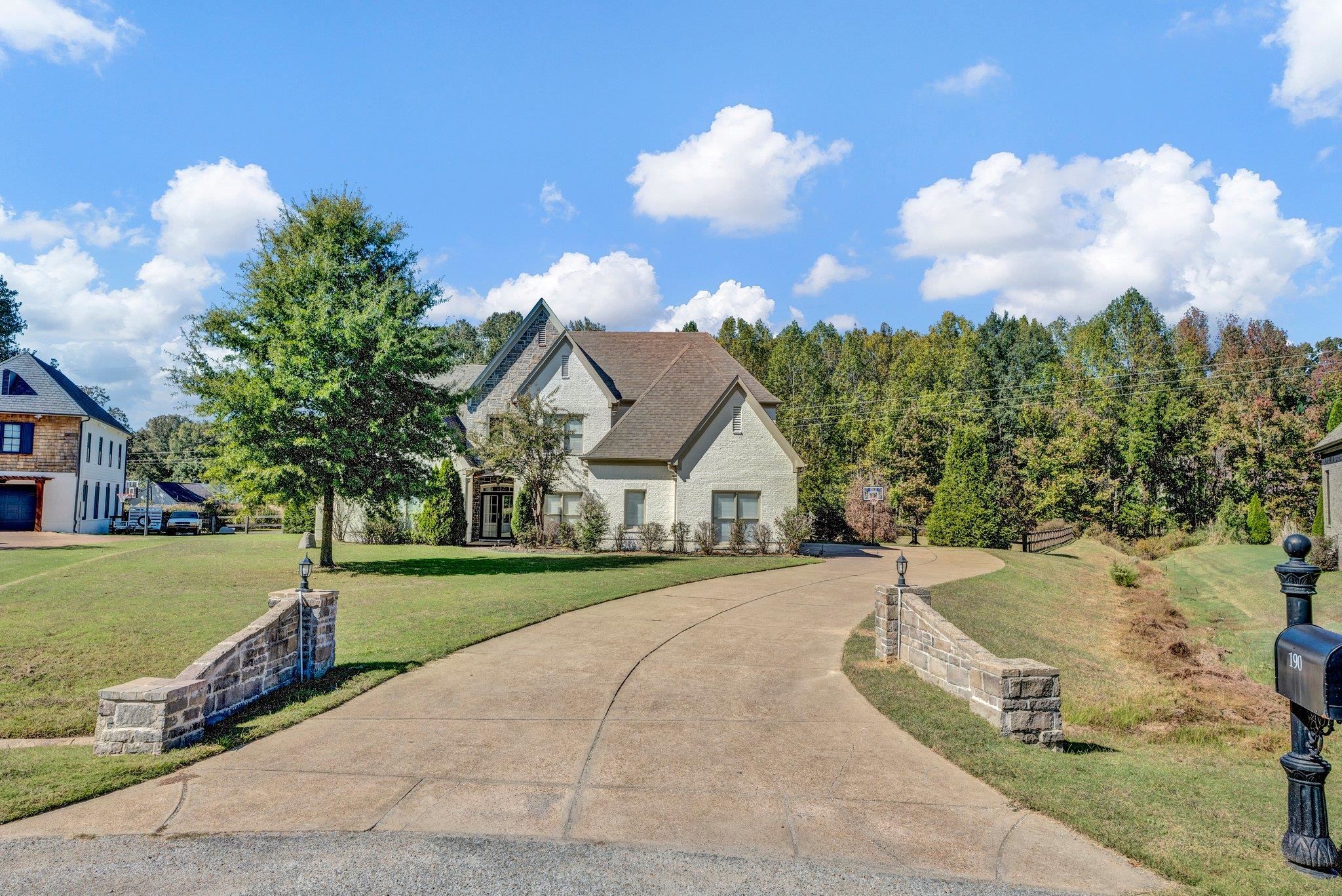 View of front of property with a front yard