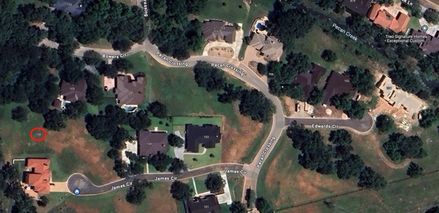 an aerial view of a house with outdoor space