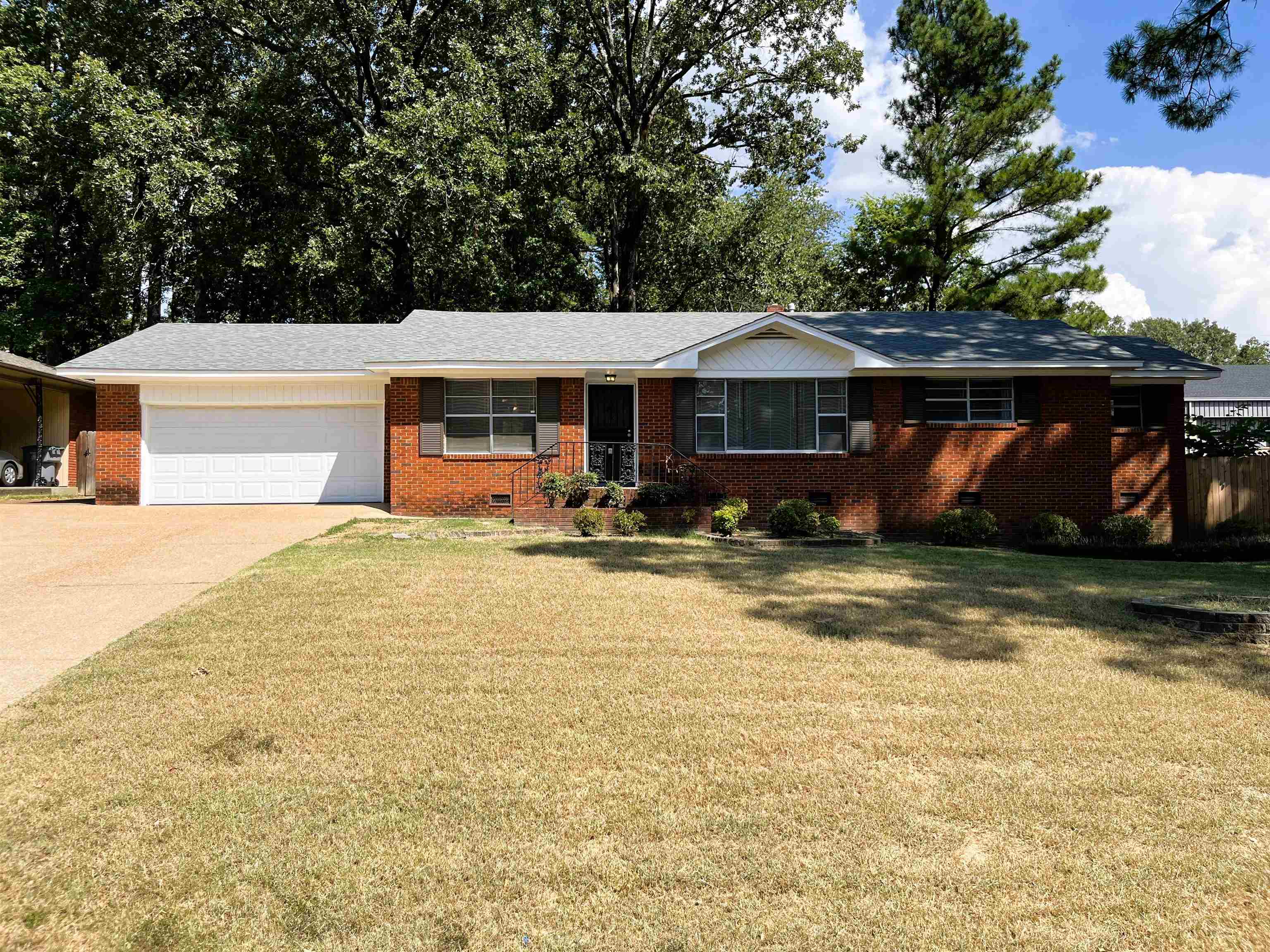 a front view of a house with patio