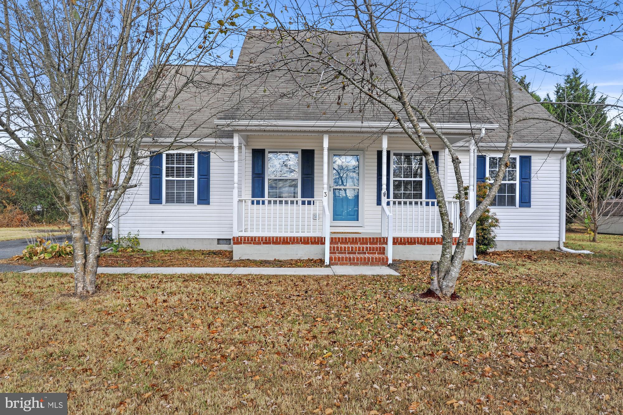 a house with trees in front of it