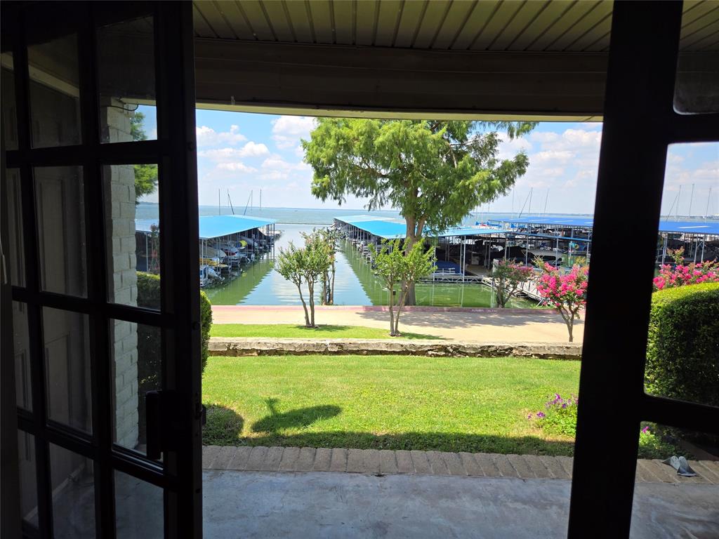 a view of swimming pool from a balcony