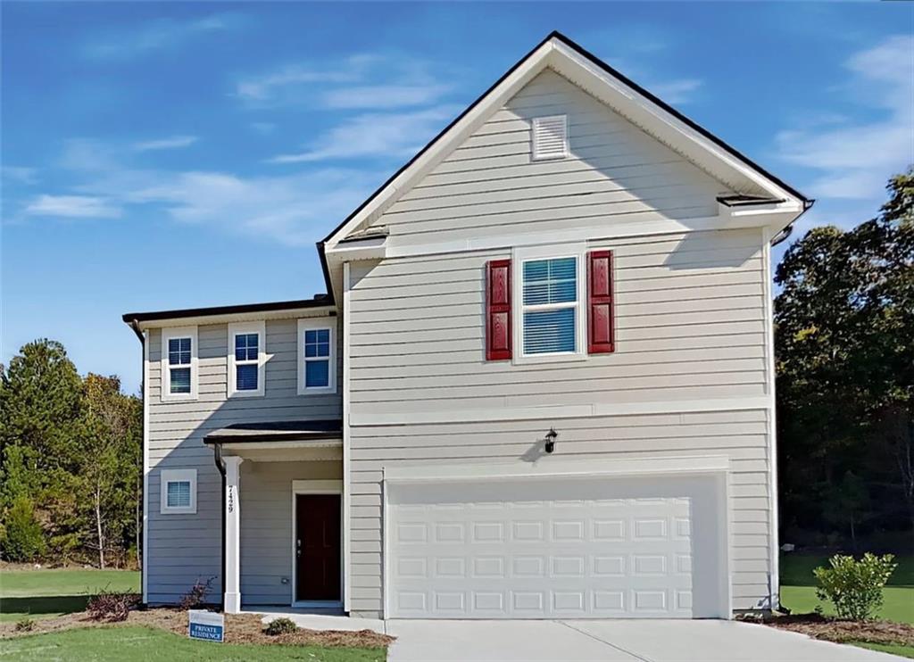 a view of a house with garage