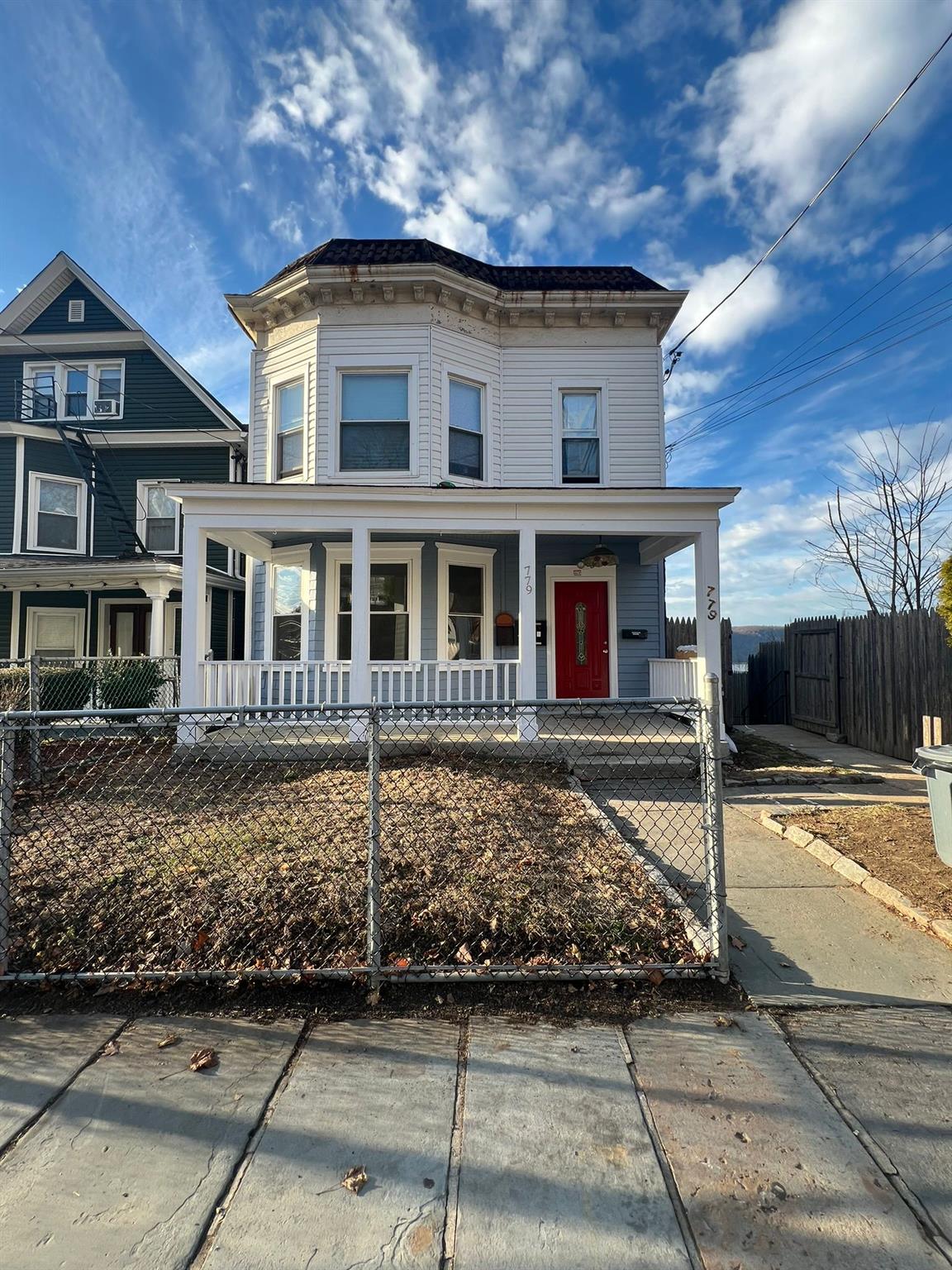 a front view of a house with yard