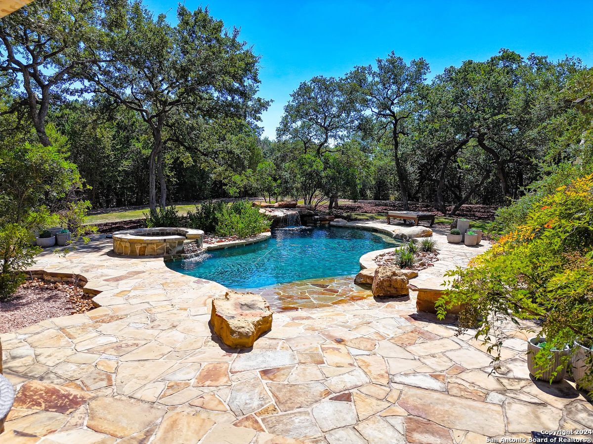 a view of a lake with a sitting area