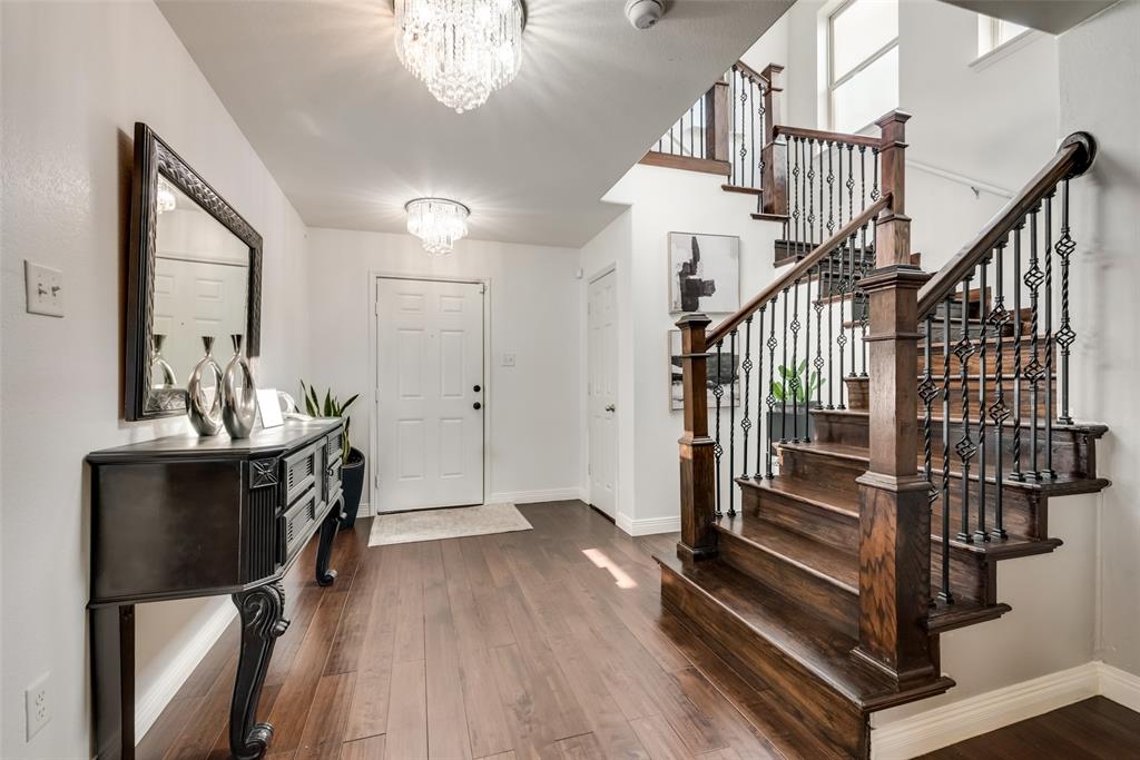 a view of entryway with wooden floor