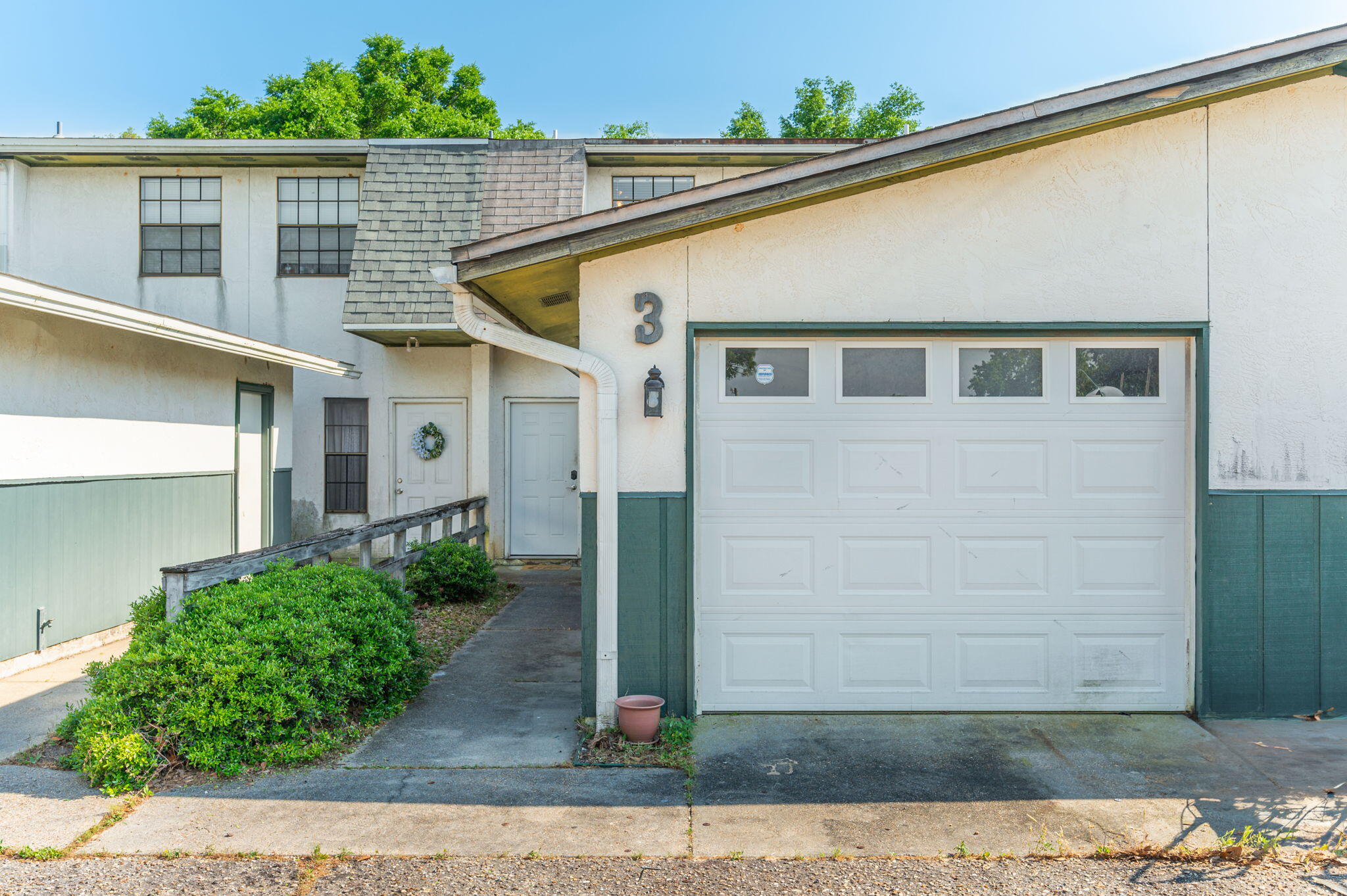 a view of a house with garage