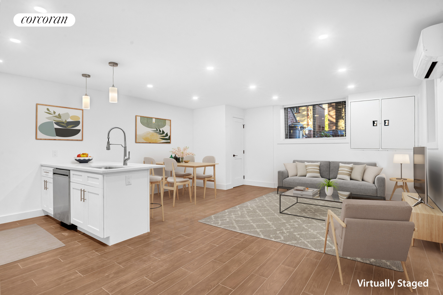 a living room with furniture and wooden floor