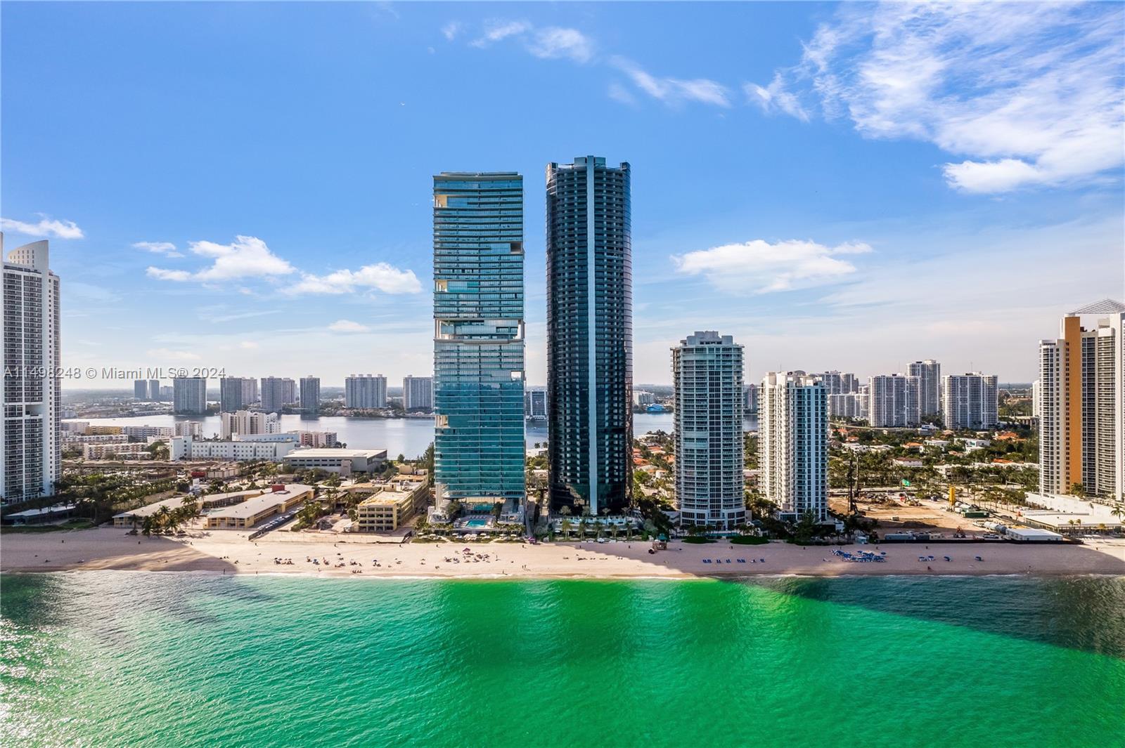 a view of a city with tall buildings