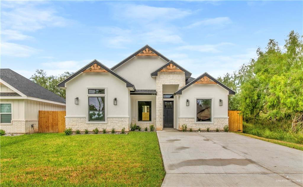 View of front of house featuring a front yard