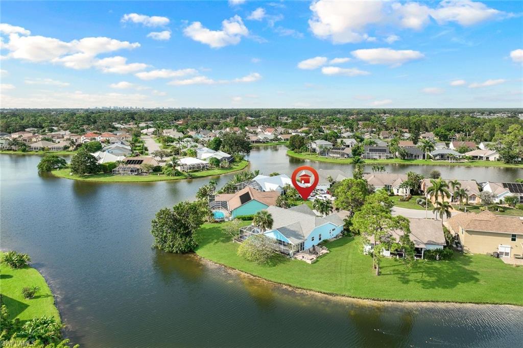 a view of a lake with houses