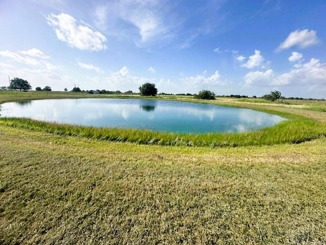 a view of a lake in between of building