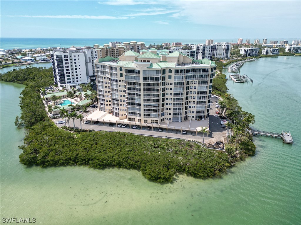 a view of a lake with a multi story building