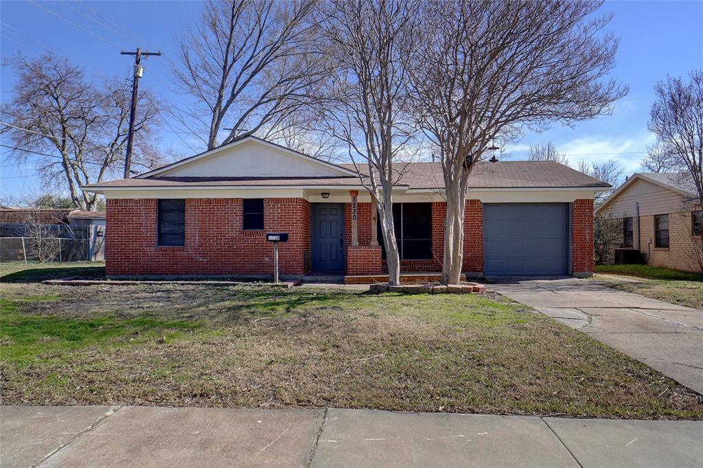 a backyard of a house with yard and garage