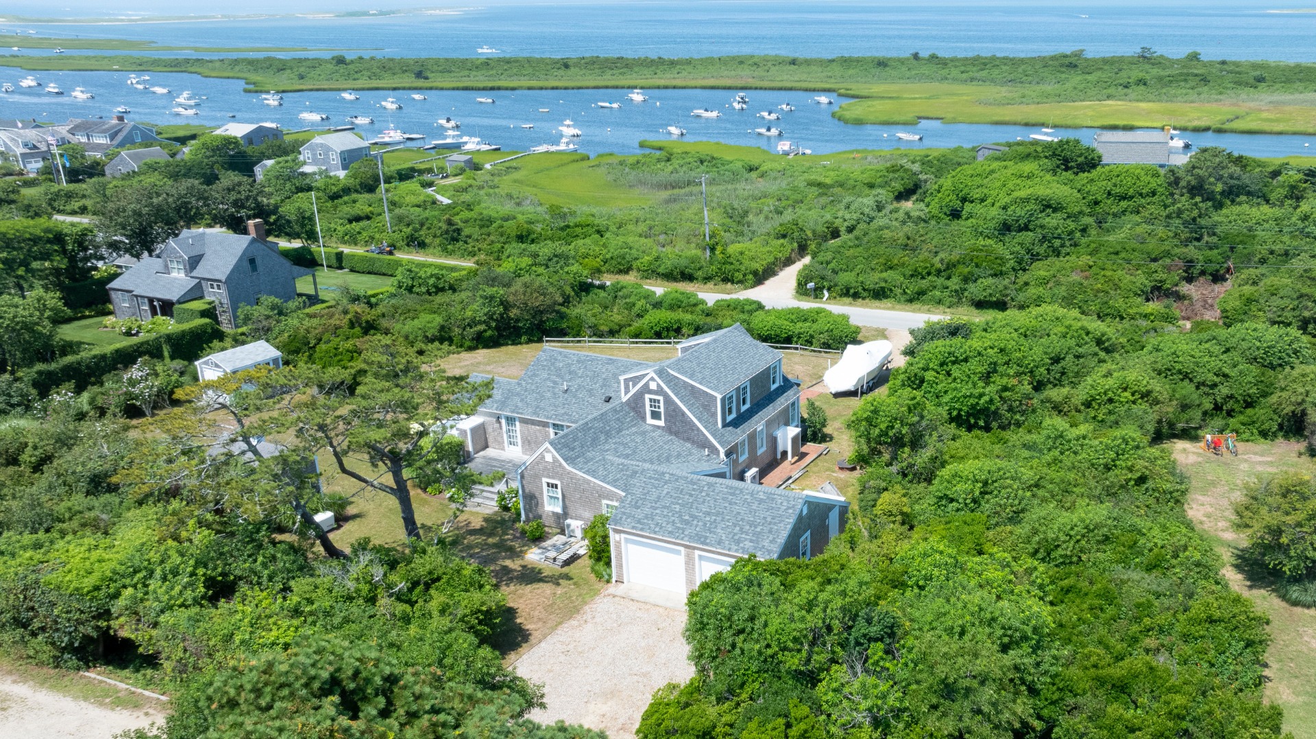 an aerial view of a house with a garden