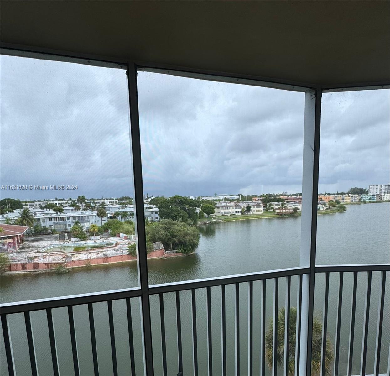 a view of a lake from a balcony