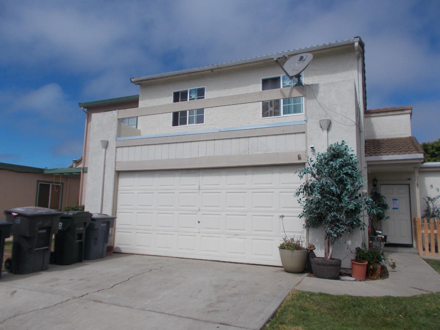 a view of house with yard