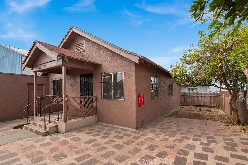 a front view of a house with patio