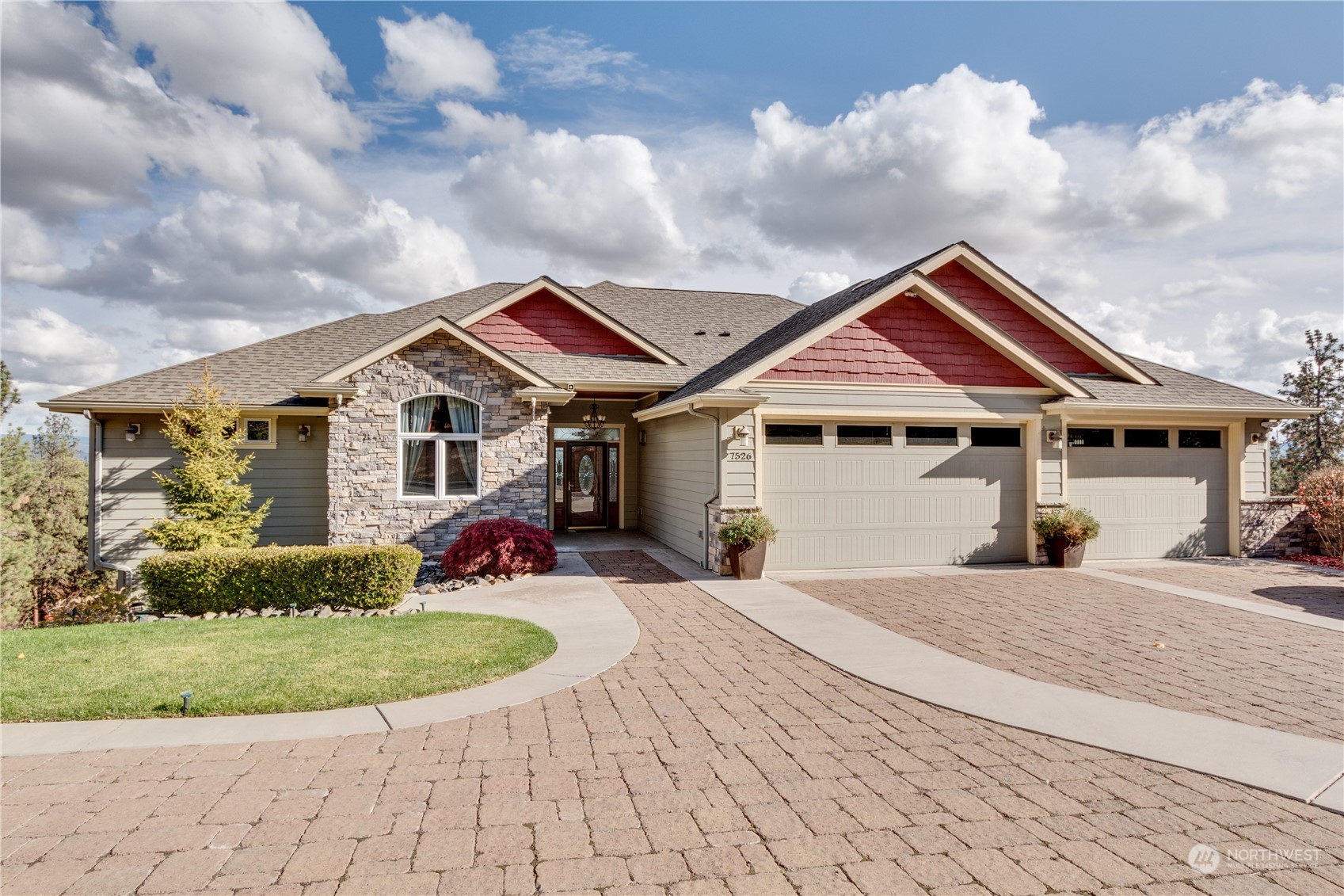 a front view of a house with a yard outdoor seating and barbeque oven