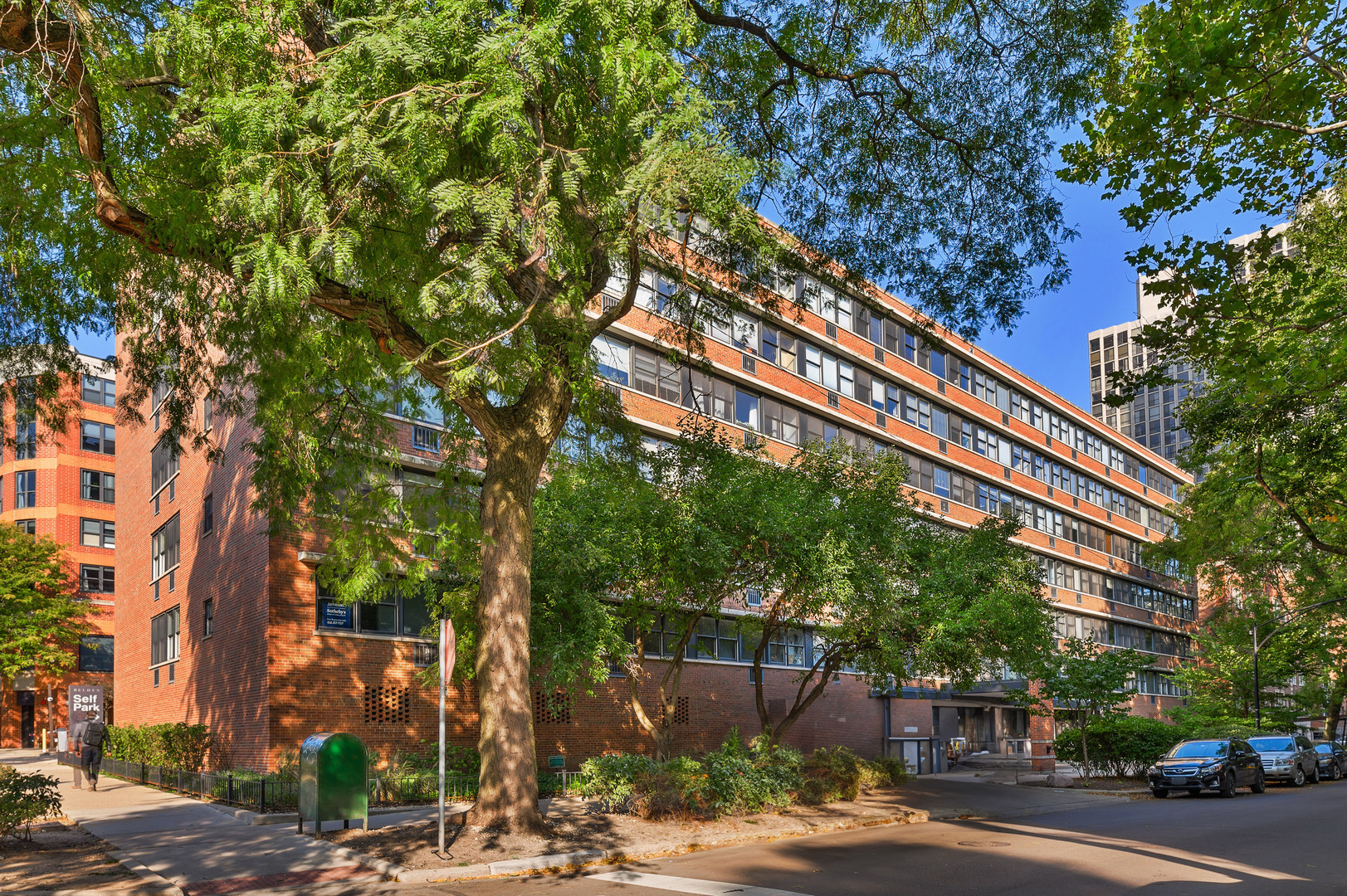 a building with trees in front of it