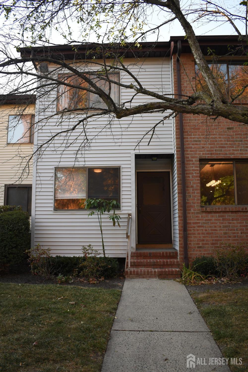 a front view of a house with a garage