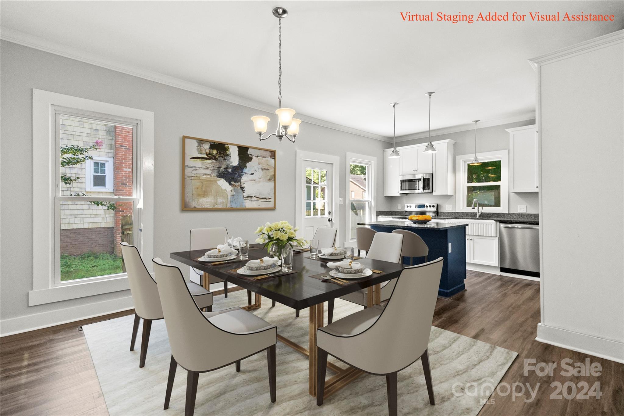 a dining room with furniture a window and kitchen view