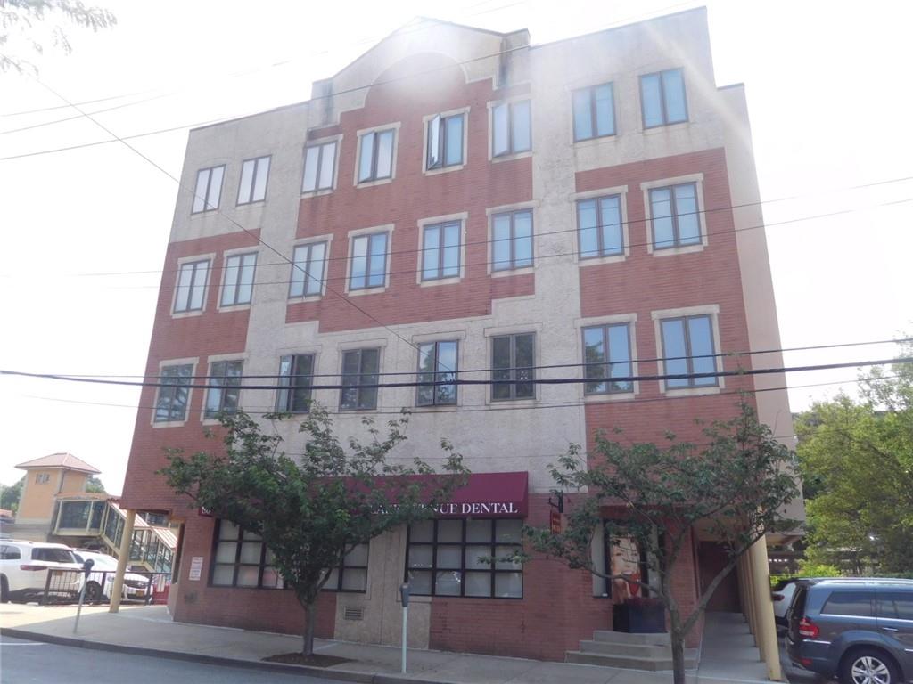 a front view of a building with balcony