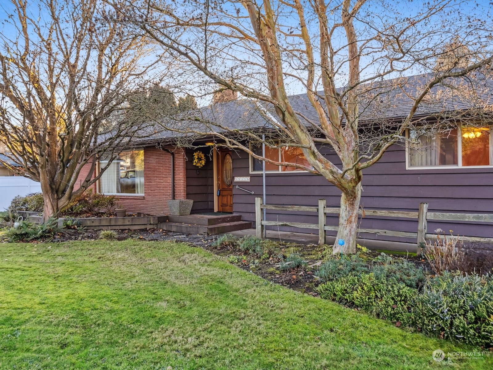 a backyard of a house with lots of green space